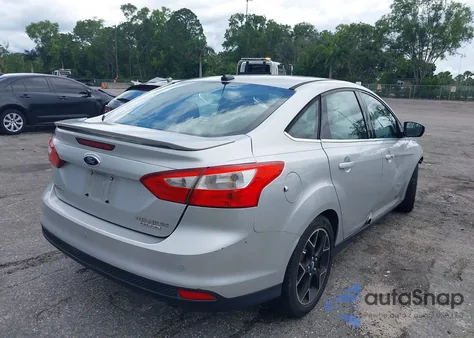 2012 Ford Focus Titanium z USA, uszkodzony, nr VIN 1FAHP3J28CL381248